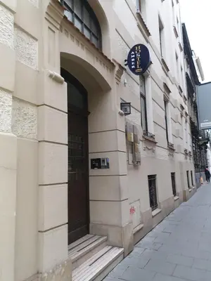 a building with a door on the side of a street at AMBER APARTAMENt 11 in Kraków