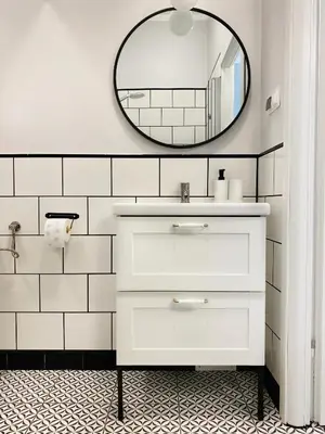 a bathroom with a sink and a mirror at Cozy Apartment in the heart of Jewish District in Kraków