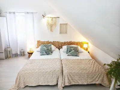 a bedroom with two beds with pillows at Eleonor Accommodation exclusive house in Liszki