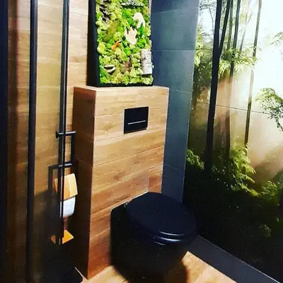 a bathroom with a fish tank and a toilet at Eleonor Accommodation exclusive house in Liszki