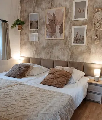 a bedroom with two beds and a large mirror at Eleonor Accommodation exclusive house in Liszki