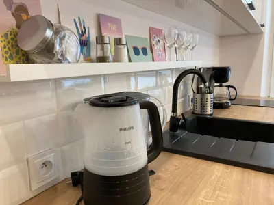 a blender sitting on a counter in a kitchen at Duo 1 Debniki Cozy Kraków Base 10-min to Wawel & Kazimierz Fast Wi-Fi in Kraków