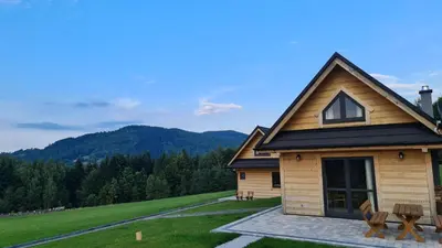 a cabin with a view of the mountains at Ostoja Jaworskie in Stryszawa