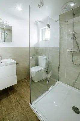 a bathroom with a shower and a toilet and a sink at Ostoja Jaworskie in Stryszawa