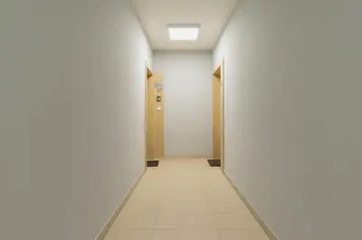 an empty corridor in an office building at Mogilska Apartments by Renters Prestige in Kraków