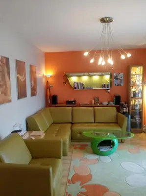 a living room with a couch and a table at Chata Mego Brata in Limanowa