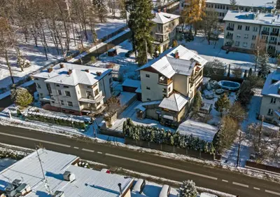 an aerial view of a house in the snow at Apartament Joanna in Rabka
