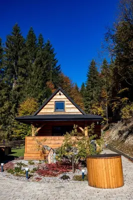 a log cabin with a window on top of it at Kocierska Chata in Kocierz Rychwałdzki