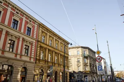 a group of buildings on a city street at LION apartments - LaBA in Kraków
