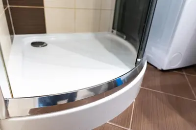 a white bath tub sitting next to a shower at Cracow nest - 2 separate rooms, heart of Kazimierz in Kraków
