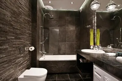 a bathroom with a toilet and a tub and a sink at Apartamenty Prestige Browar Lubicz Stare Miasto in Kraków