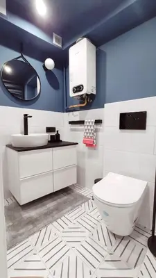 a bathroom with a white toilet and a sink at Kremerowska 9 by Homeprime in Kraków