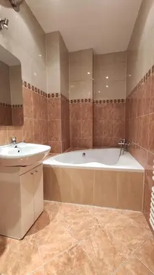 a large bathroom with a tub and a sink at Floriańska 10 by Homeprime in Kraków