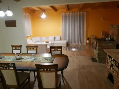 a living room with a table and a couch at 22 Kąty in Radziemice