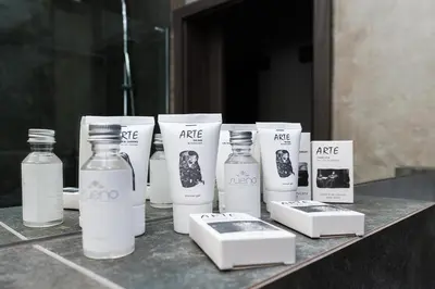 a group of bottles of milk on a counter at Mary&Arte Apartments Browar Lubicz in Kraków