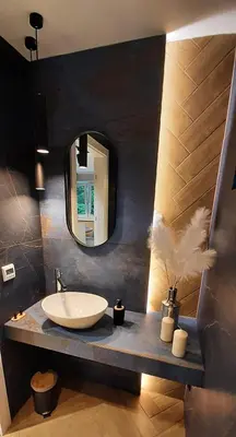 a bathroom with a sink and a mirror at Apartament Willa Pod Sosnami Zator Przeciszów in Zator