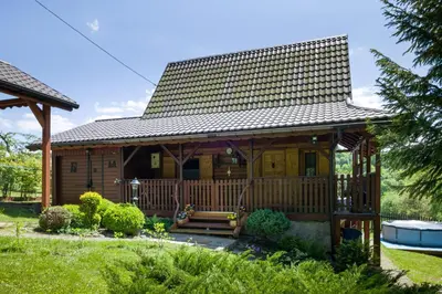 a bathroom with a sink and a shower at Andrzejówka in Kocoń