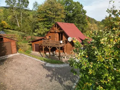 an aerial view of a barn with a parking lot at Ranczo Targoszów in Targoszów