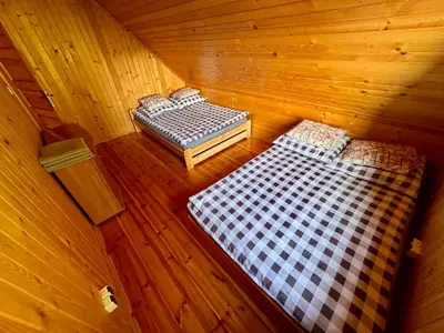 an overhead view of two beds in a cabin at Ranczo Targoszów in Targoszów