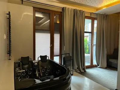 a living room with a dj equipment in the middle of the room at Jacuzzi Rakowicka Top Apartments in Kraków