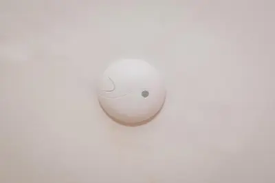 a white computer mouse sitting on top of a table at Laykonik in Kraków