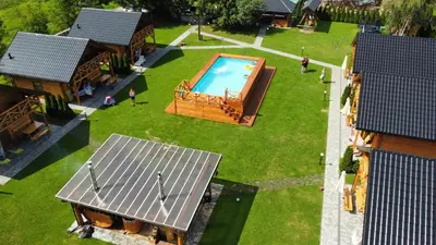 an overhead view of a swimming pool in a yard at Chatki U Hanusi in Czchów