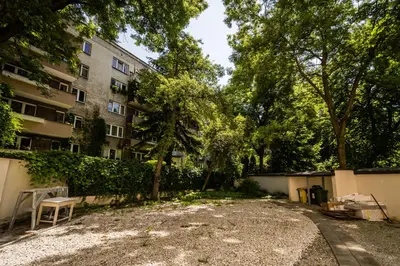 a large yard in front of a building at Mickiewicza Old Town Apartment WAWELOFTS in Kraków