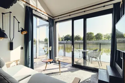 a buffet with many different types of sushi and vegetables at New Port Aparthotel in Kraków