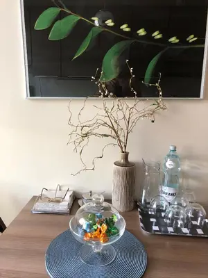 a table with a bowl of food on top of it at Apartament Siewna-moje miejsce na idealne wakacje in Kraków