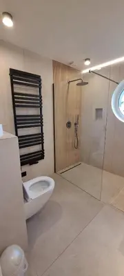 a bathroom with a shower and a toilet and a sink at SOSNOWA 23 in Tenczynek