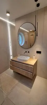 a bathroom with a sink and a mirror at SOSNOWA 23 in Tenczynek