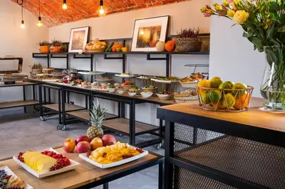 a buffet line with many different types of food at MR67 Mayera Rapaporta in Kraków