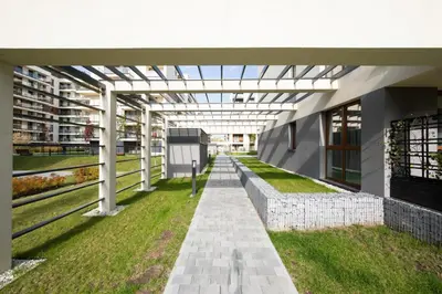 an external view of a building with a glass roof at Wrocławska Two Bedroom Apartment in Kraków
