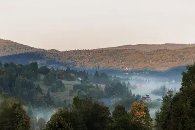 a window with a view of a mountain at Osada Mosorny Groń - Zawoja in Zawoja