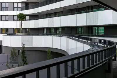 an external view of a building with a bridge at Barska 69 Apartments in Kraków