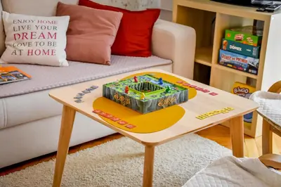 a table with a cake on top of it at Apartament w Alejce in Rabka