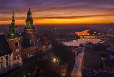 an aerial view of a city at night at Luxury Jacuzzi Apartment in Kraków