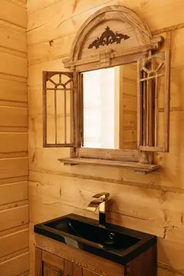 a bathroom with a sink and a mirror at NA BALI po góralsku in Poręba Wielka