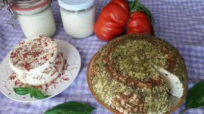 a table with two plates of food and some milk at Siedlisko Pauza in Kozłów