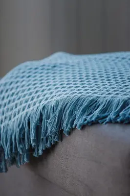 a close up of a persons thigh with a mattress at Apartment Smoluchowskiego Cracow by Noclegi Renters in Kraków