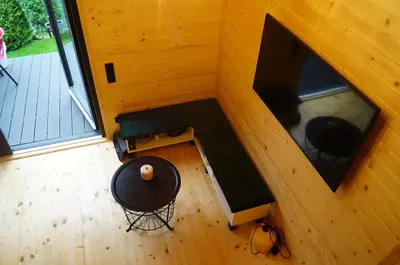 an overhead view of a room with a table and a television at Mały domek w Dolinie Prądnika in Sułoszowa