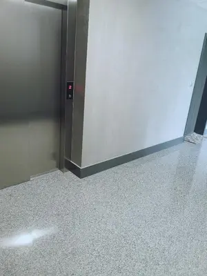 a door in a room with a tile floor at Apartament Źródełko in Bochnia
