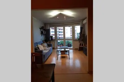 a living room with a couch and a table at Miło powitać Cię w Krakowie. in Kraków