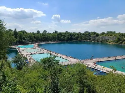 a large pool of water with people on a pier at Miło powitać Cię w Krakowie. in Kraków