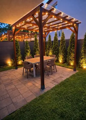 a kitchen with a table with a bowl of fruit on it at Prestigious Residence with Garden, Garage, and Elegant Rooms in Kraków