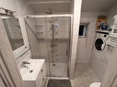a bathroom with a shower and a sink at Feel like in Heaven in Bachowice