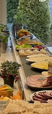 a long table with plates of food on it at Dębowy Zakątek - SPOKOJNY, KOMFORTOWY WYPOCZYNEK W OKOLICY KRAKOWA in Radziszów