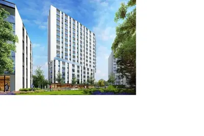 a large white building with a lot of windows at Apartamenty Platinex 4 in Kraków