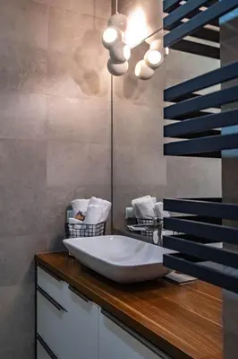 a bathroom with a sink and a mirror at Smart Executive in Kraków