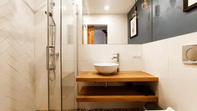 a bathroom with a sink and a shower at Zamkowa 9 Apartment with a view on Wawel Castle by Homeprime in Kraków